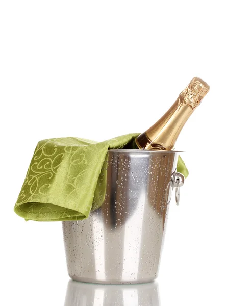Flasche Champagner im Eimer isoliert auf weiß — Stockfoto