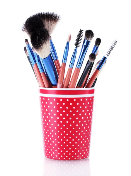 Make-up brushes in red cup isolated on white — Stock Photo, Image