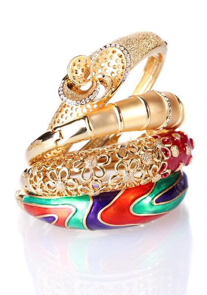 Beautiful golden bracelets isolated on white — Stock Photo, Image