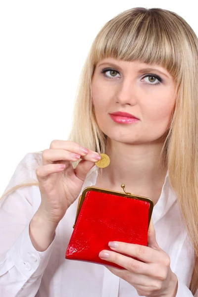 Uma mulher coloca dinheiro na bolsa isolado no branco — Fotografia de Stock