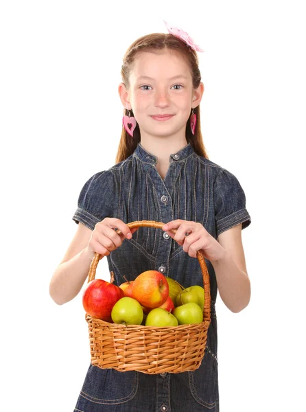 Beautiful little girl holding basket of apples isolated on white — Stock Photo, Image