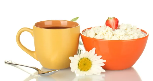 stock image Cottage cheese with strawberry in orange bowl and orange cup with coffee, spoon and flower isolated on white