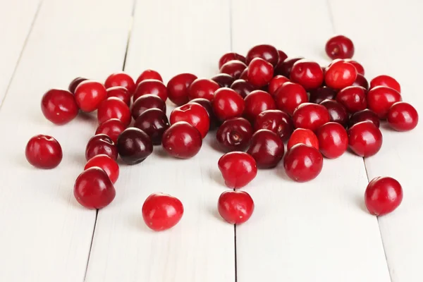 stock image Fresh cherry on white wooden table close-up