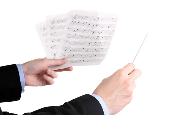 Müzik iletken elleriyle baton ve üzerinde beyaz izole notlar — Stok fotoğraf