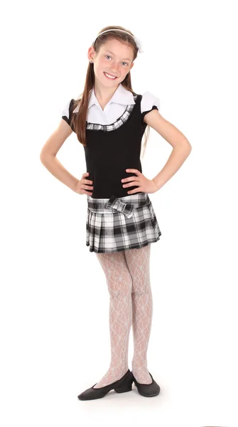 Hermosa niña en uniforme escolar aislado en blanco Fotos de stock libres de derechos