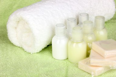 Hotel amenities kit on towel clipart