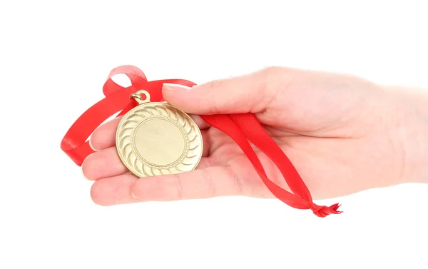 Médaille d'or à la main isolée sur blanc — Photo