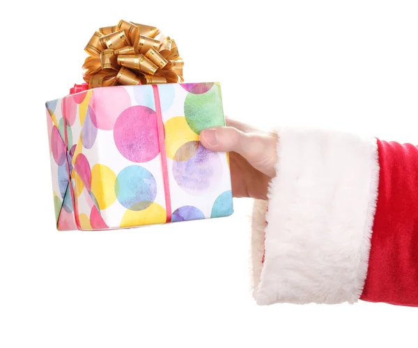 Papai Noel mão segurando caixa de presente isolado no branco — Fotografia de Stock