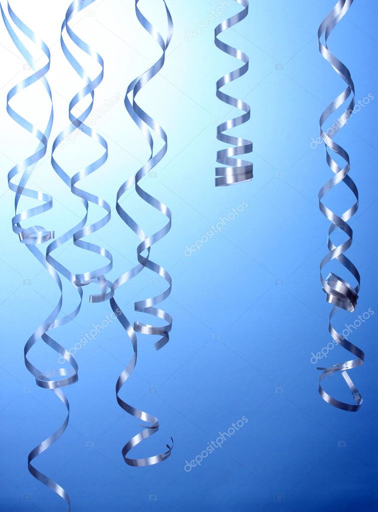 Beautiful streamers on blue background