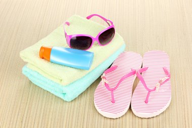 Beach accessories on mat