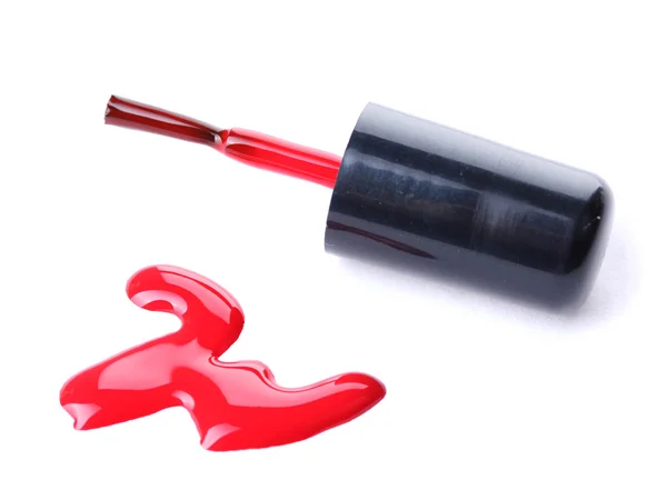 Rött nagellack och borste isolerad på vit — Stockfoto