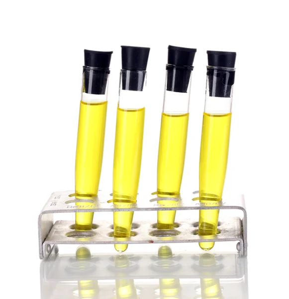 Tubes à essai avec liquide jaune isolé sur blanc — Photo