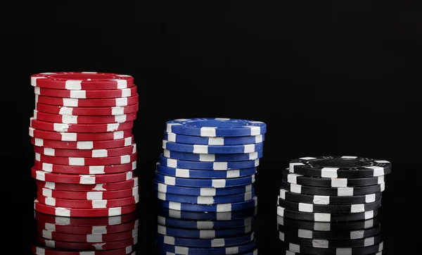 Casino chips isolated on black — Stock Photo, Image