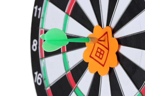 Darts with stickers depicting the life values close-up on white background — Stock Photo, Image
