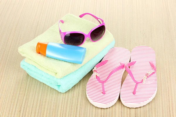 Beach accessories on mat — Stok fotoğraf