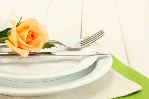 Beautiful holiday table setting with flowers — Stock Photo, Image