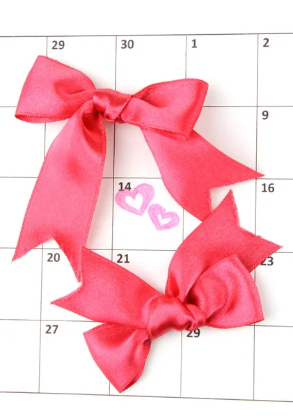 Calendar page with hearts and bows on St.Valentines Day — Stock Photo, Image