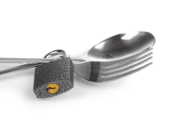 Fork and spoon with padlock close-up isolated on white — Stock Photo, Image