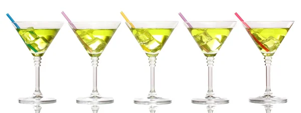 Yellow cocktail in martini glasses isolated on white — Stock Photo, Image