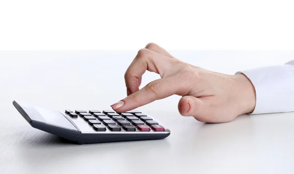 Mão mulheres e Calculadora isolado no branco — Fotografia de Stock