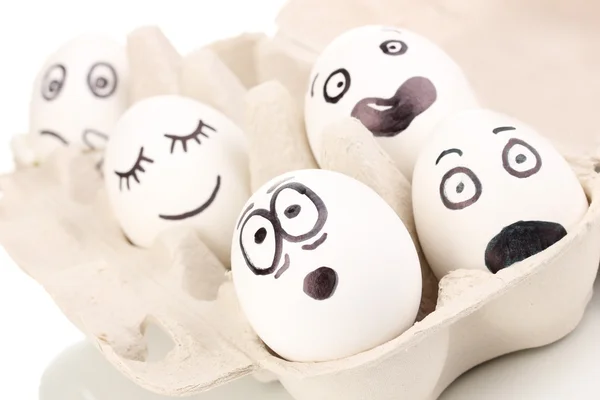 Fehér tojás vicces arcok — Stock Fotó