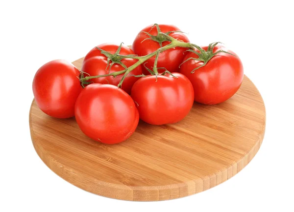 Fresh tomatoes on wooden board isolated on white — Stock Photo, Image