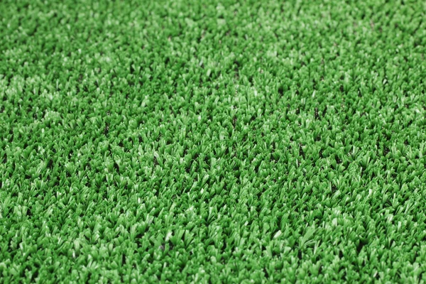 De achtergrond van groen gras — Stockfoto