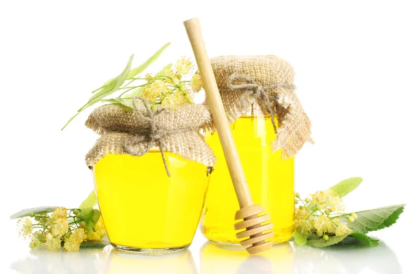 シナノキの蜂蜜と花を白で隔離される jar ファイル — ストック写真
