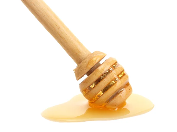 Rociador con miel dulce aislado en blanco —  Fotos de Stock