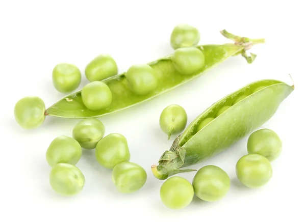 Beyazlar üzerinde yeşil bezelyeler — Stok fotoğraf