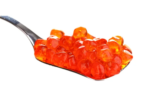 Red caviar in silver spoon isolated on white — Stock Photo, Image
