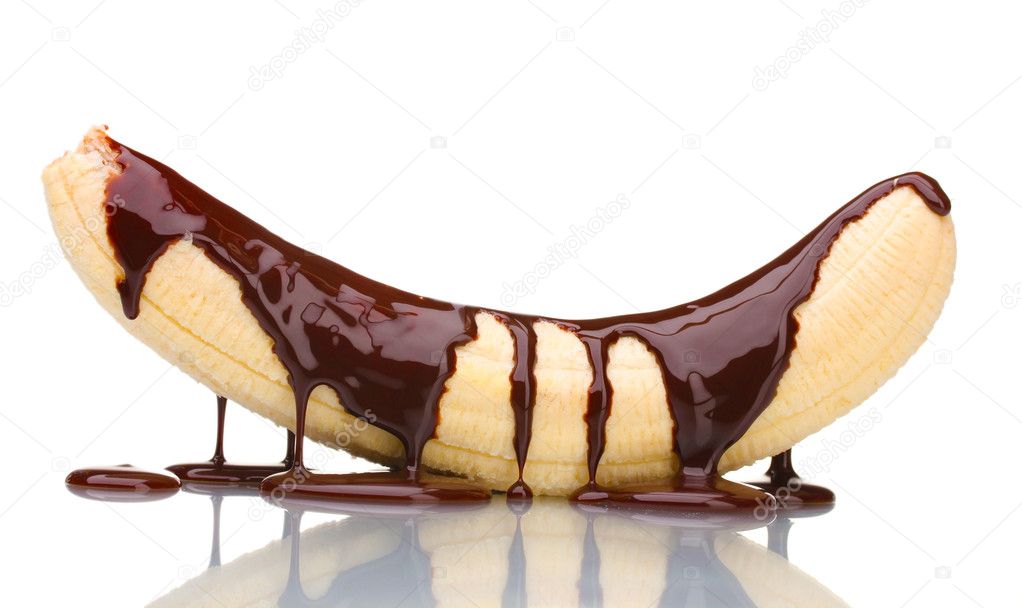 Banana poured with liquid chocolate isolated on white