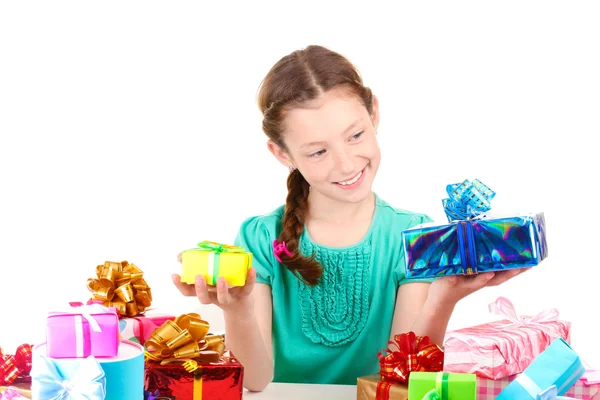 Little girl with gifts isolated on white — Stock Photo, Image