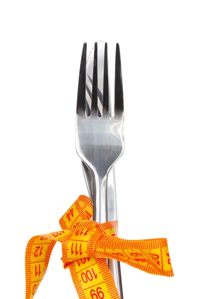 Çatal, bıçak ve ölçüm bandı üzerinde beyaz izole — Stok fotoğraf