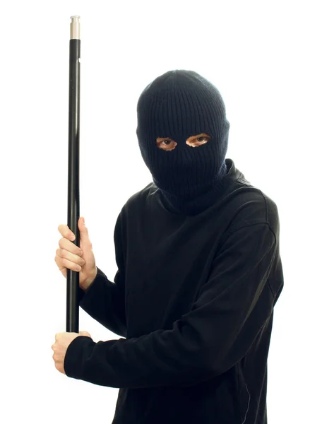 Bandido em máscara preta com tubo isolado em branco — Fotografia de Stock