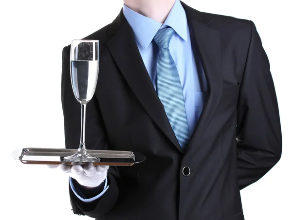 Camarero formal con un vaso de agua en bandeja de plata aislada en blanco — Foto de Stock