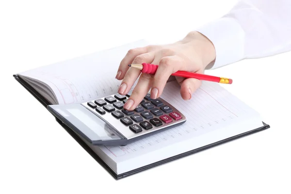 Kobieta ręce z ołówkiem, notatnik, kalkulator na białym tle — Zdjęcie stockowe