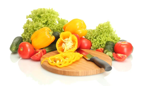 Fresh vegetables and knife on cutting board isolated on white — Stock Photo, Image