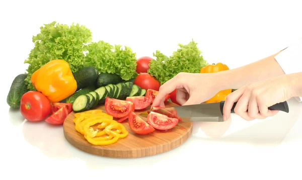 Woman hands cutting vegetables on kitchen blackboard — Stock Photo, Image