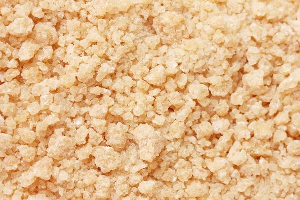 Brown cane sugar background close-up — Stock Photo, Image