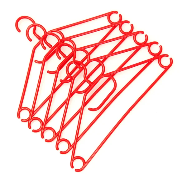 Plastic hangers isolated on white — Stock Photo, Image