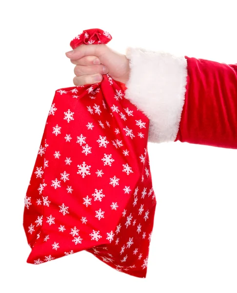 圣诞老人只手握住包上白色隔离的礼物 — 图库照片