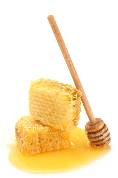 Gouden honingraten met honing geïsoleerd op wit — Stockfoto