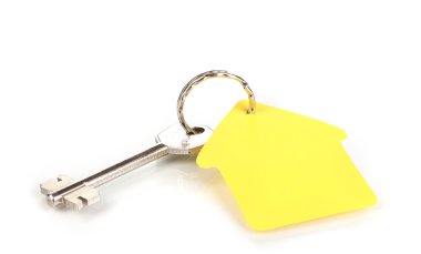Key with house-shaped charm isolated on white clipart