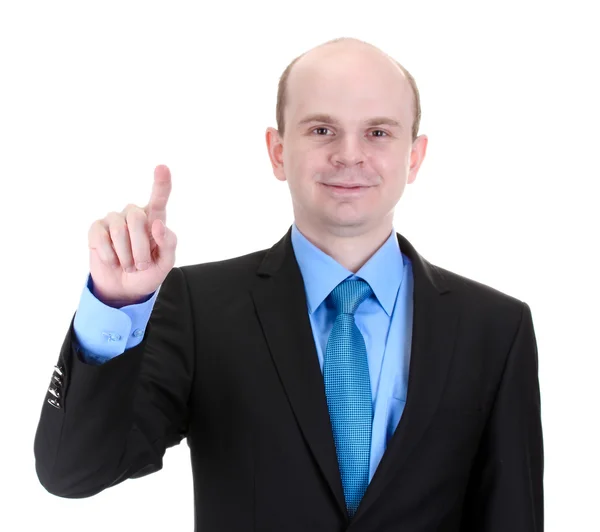 Ο άνθρωπος των επιχειρήσεων σε ένα κοστούμι που δείχνει σε μια οθόνη που απομονώνονται σε λευκό — Φωτογραφία Αρχείου
