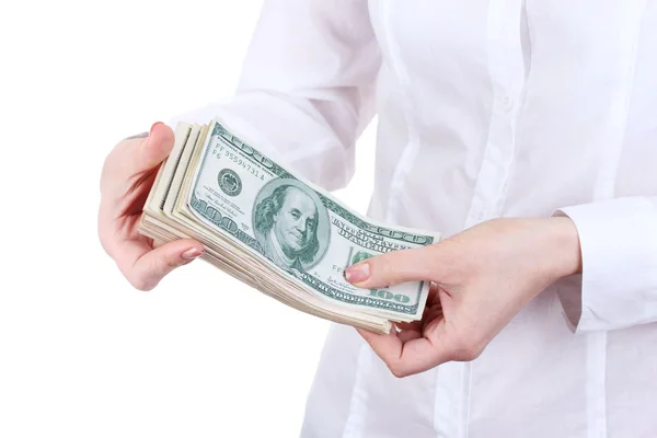 Dolarów amerykańskich w rękach kobiet na białym tle — Zdjęcie stockowe