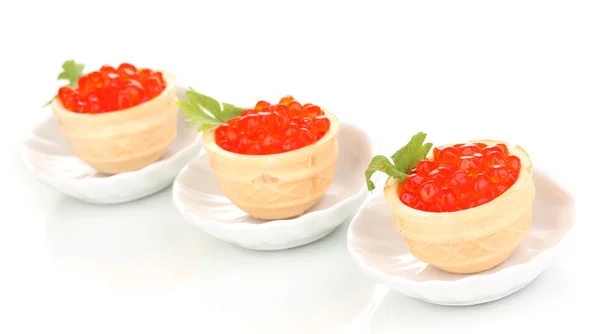 Red caviar in tartlets on little white saucers isolated on white — Stock Photo, Image