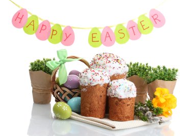 Beautiful Easter cakes, colorful eggs in basket and pussy-willow twigs isolated on white clipart