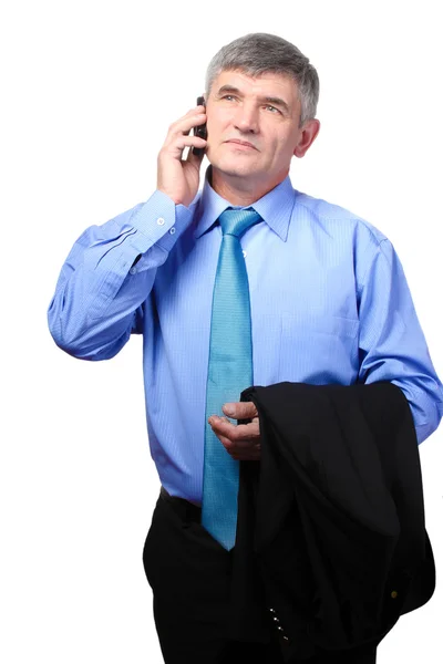 Geschäftsmann am Telefon gegen Isolation in Weiß — Stockfoto