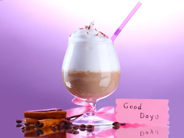Glass of coffee cocktail on purple background — Stock Photo, Image